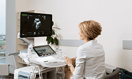 doctor examining the baby movements