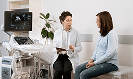 mother consulting with doctor