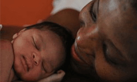 mother holding her child