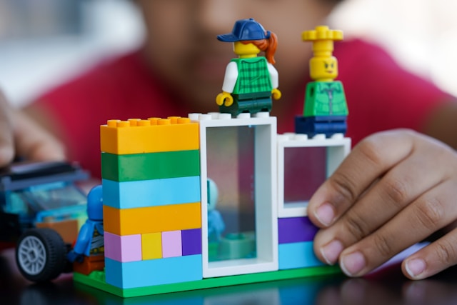 Close up of Boy playing with Lego